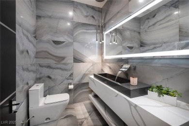 The Highlander Estate in Guard Gated MacDonald Highlands. Modern