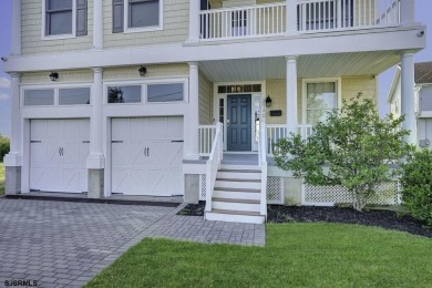 NOW IS YOUR CHANCE TO OWN A CUSTOM BUILT BAY FRONT HOME. THIS