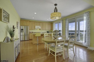 NOW IS YOUR CHANCE TO OWN A CUSTOM BUILT BAY FRONT HOME. THIS