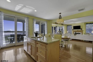 NOW IS YOUR CHANCE TO OWN A CUSTOM BUILT BAY FRONT HOME. THIS