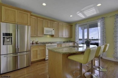 NOW IS YOUR CHANCE TO OWN A CUSTOM BUILT BAY FRONT HOME. THIS