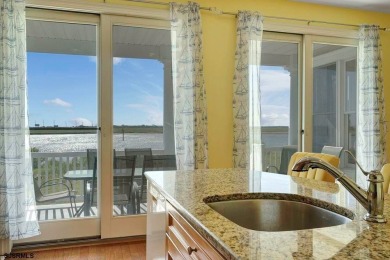 NOW IS YOUR CHANCE TO OWN A CUSTOM BUILT BAY FRONT HOME. THIS