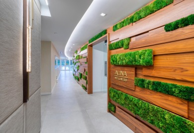 Immersed in verdant, canopied landscaping, offering panoramic