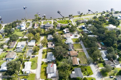 Calling all investors, handymen, and dreamers! This 2-bedroom