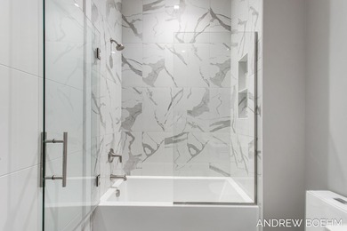 Luxury Downtown Living with Custom Finishes and Lake Views