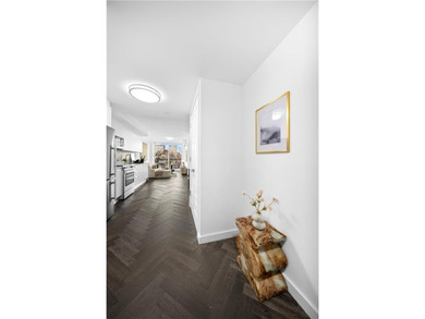 Modern Condo Living with 2 Outdoor Spaces and Deeded Parking in