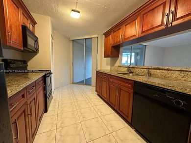 1 bedroom and 1.5 bath in the heart of Sunrise. Unit with