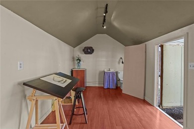 Nestled in the desirable Warwick Neck community, this inviting