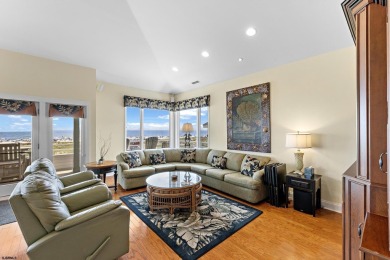 This spectacular 5 bedroom, 4 full bath, 2nd floor beachfront