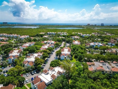 Welcome to carefree coastal living in this beautifully