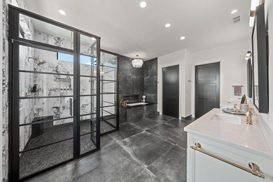 Discover luxury living in the exclusive gated community of