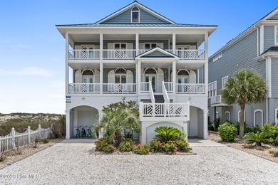 Oceanfront paradise awaits! This stunning 8-bedroom, 6
