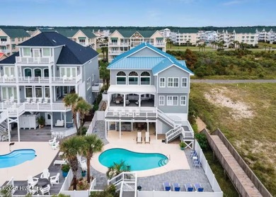Oceanfront paradise awaits! This stunning 8-bedroom, 6