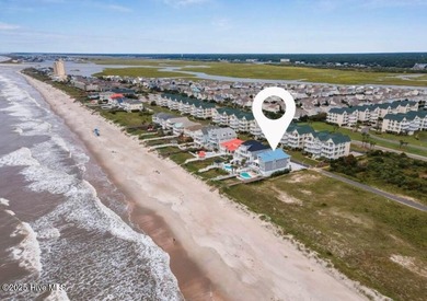 Oceanfront paradise awaits! This stunning 8-bedroom, 6