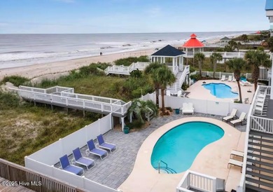 Oceanfront paradise awaits! This stunning 8-bedroom, 6