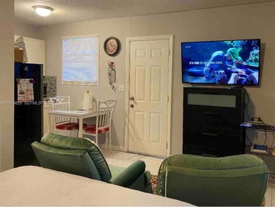 Legal income-producing fourplex on an oversized 21,780 SF lot in