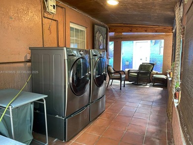 Legal income-producing fourplex on an oversized 21,780 SF lot in