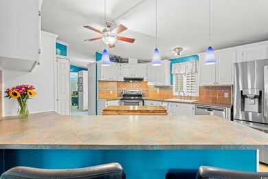 Welcome to 467 Freedom Circle, a beautifully enhanced residence