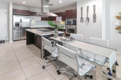 Elegant 2BD/2BA at 7928 East Dr with beautiful city + bay views