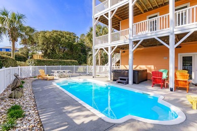 This stunning home is located in the highly desirable gated