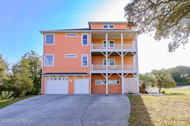 This stunning home is located in the highly desirable gated