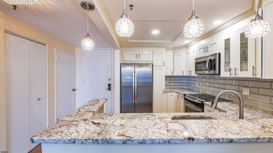 Welcome to this impeccably remodeled 1 Bed, 1.5 Bath Ocean Front