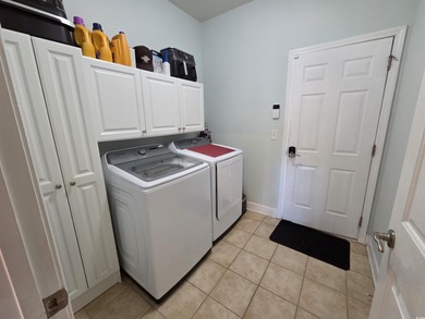 This home is the rare D.R. Horton *Sanibel* model in The Farm at