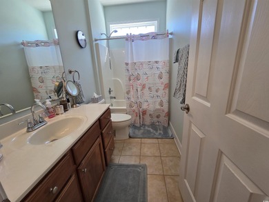 This home is the rare D.R. Horton *Sanibel* model in The Farm at