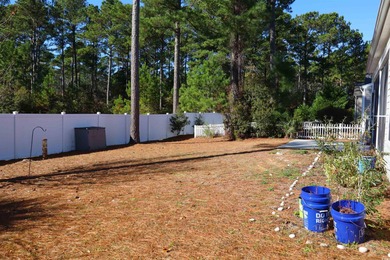 This home is the rare D.R. Horton *Sanibel* model in The Farm at