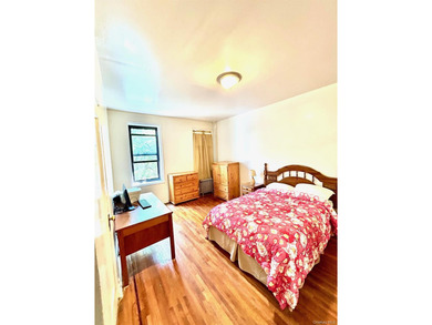BACK ON THE MARKET!! 2-bedroom co-op, nestled on the second