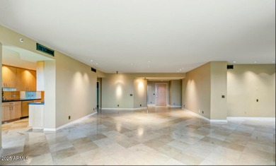 MOTIVATED SELLER! Experience sophisticated high-rise living at