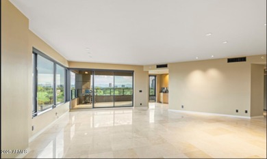 MOTIVATED SELLER! Experience sophisticated high-rise living at