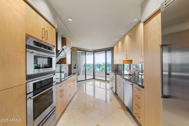 MOTIVATED SELLER! Experience sophisticated high-rise living at