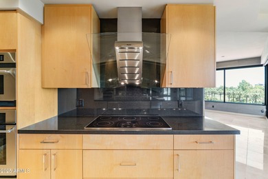 MOTIVATED SELLER! Experience sophisticated high-rise living at