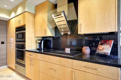 MOTIVATED SELLER! Experience sophisticated high-rise living at