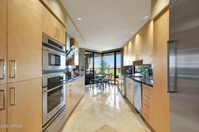 MOTIVATED SELLER! Experience sophisticated high-rise living at