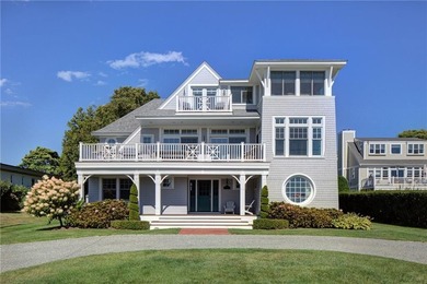 Set above the waves, this 4 bed, 4.5 bath coastal masterpiece
