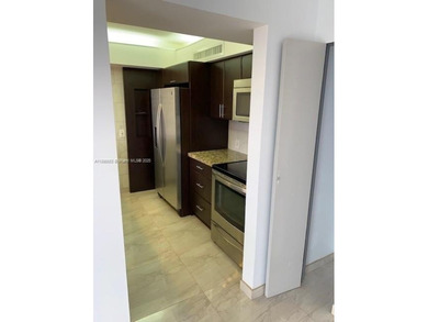 Beautifully updated 1-bedroom, 1.5-bath condo in the desirable