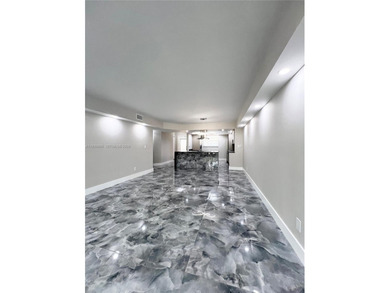 STUNNING HOME IN THE HEART OF TAMARAC. NEW ROOF NEW ELEVATOR ALL