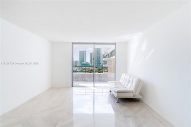 Step into luxury in this fully renovated 1 bed + den, 1.5 bath