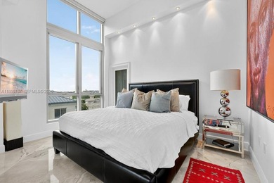 Modern Loft-Style Corner Residence
This one-of-a-kind home