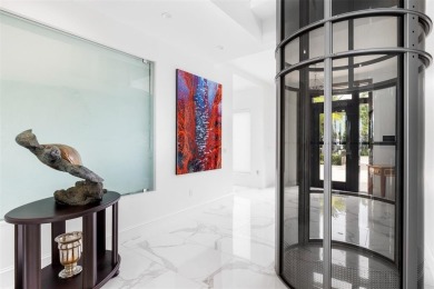 Nestled in the prestigious Sunrise Intracoastal enclave, this