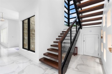 Nestled in the prestigious Sunrise Intracoastal enclave, this