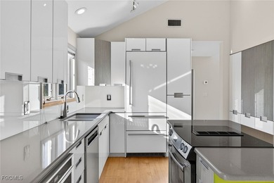 Welcome to 4400 Gulf Pines Drive, an elevated coastal home set