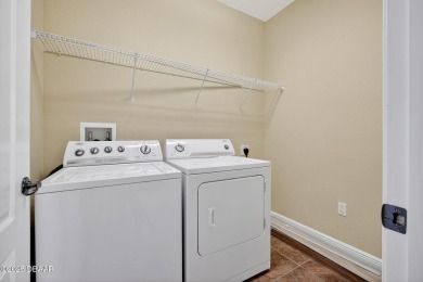 Nestled on the serene ground floor of this exclusive waterfront