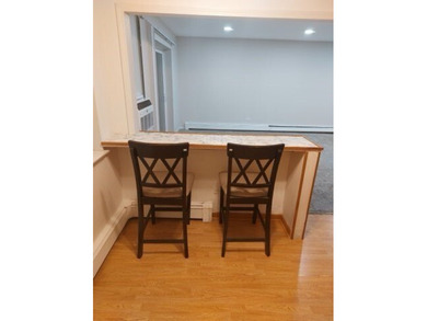 Welcome to this Top Floor Corner End Unit (No neighbors on