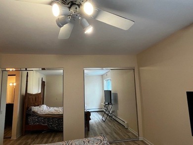 Welcome to this Top Floor Corner End Unit (No neighbors on