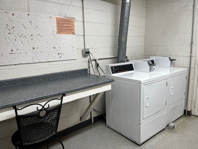 Welcome to this Top Floor Corner End Unit (No neighbors on