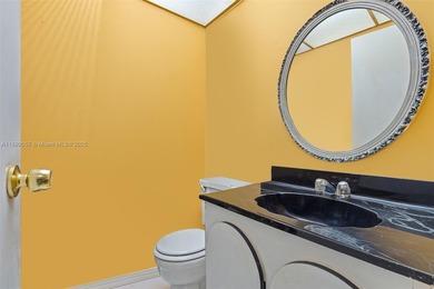 Live your dream steps from the ocean! This bright and inviting