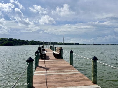 This beautiful 2 bedroom, 2 bath corner unit, ground-floor condo